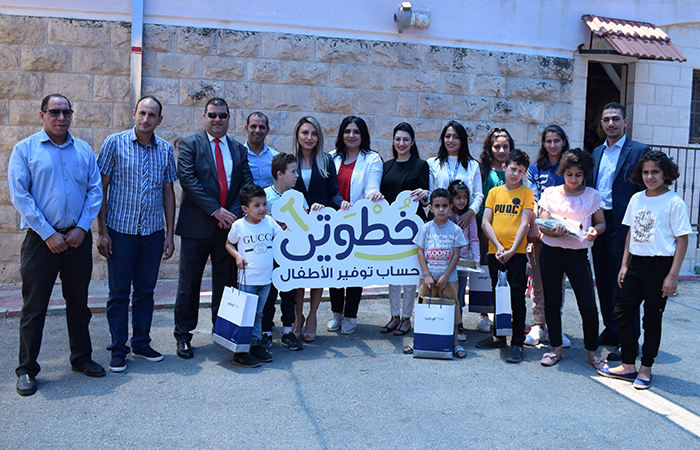 البنك الوطني يسلم الدفعة الأولى من أجهزة نت كتابي لقرى الأطفال SOS فلسطين