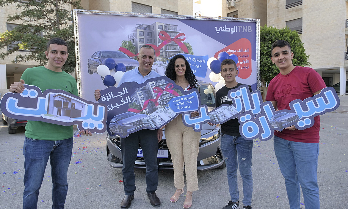 A Ramallah citizen wins the prize of a lifetime, a “house, salary, and car”, within the scope of the National Savings Program